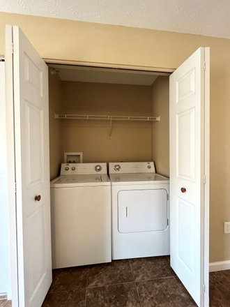 Laundry Available - University Terrace (105 E State St) Apartments