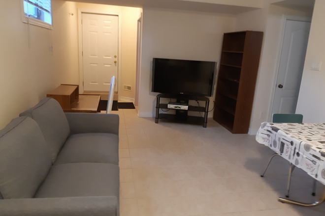 Living Room - One Bedroom Basement Apartment. All Utilities. Separate Entrance. 7 min walk to Sheppard We