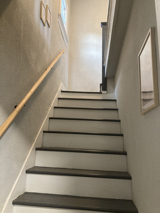 Stairs leading up to Unit B - Private Unit in Renovated Duplex less than 10 min drive to Liberty University