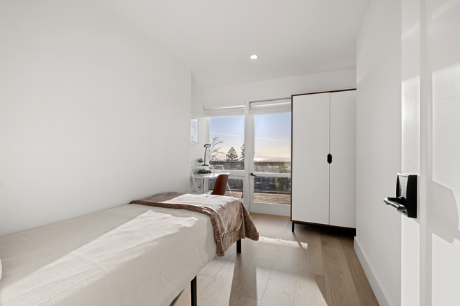 Bedroom Featuring a View - Luxe, Furnished Apartments with Panoramic SF Bay Views, Close to Campus