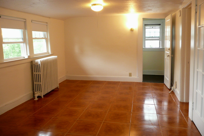 Livingroom/living area and front door entrance - Sunny and bright Studio apartment for rent in Montclair, NJ