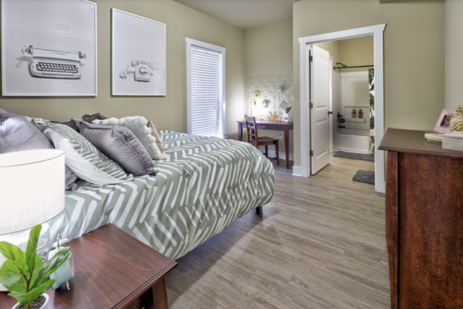 Bedroom - The Lodges of East Lansing Apartments