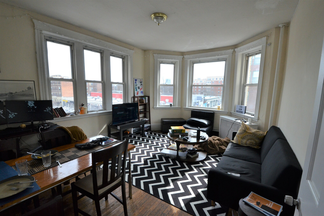 Bedroom - 4 bed 1 bath on Peterborough St - Spacious Apartments Unit with Sunny Bedrooms!