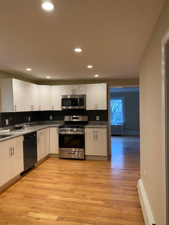 Kitchen view towards living room - Walking distance to Harvard Sq. Union Sq. Inman Sq.