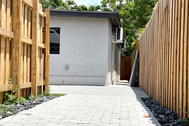 Entrance - 1 bedroom house,  patio, laundry, electricity and water included.  Nice backyard.