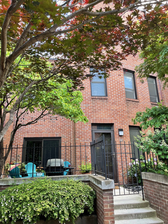 Front home view - Furnished and modernized 3BR, 2BR and office with patio and one parking spot. Townhome