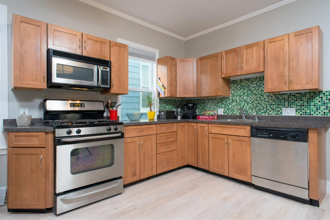 Kitchen - Modern Central Sq 3 Bed with In Unit Laundry + Open Concept Kitchen Apartments