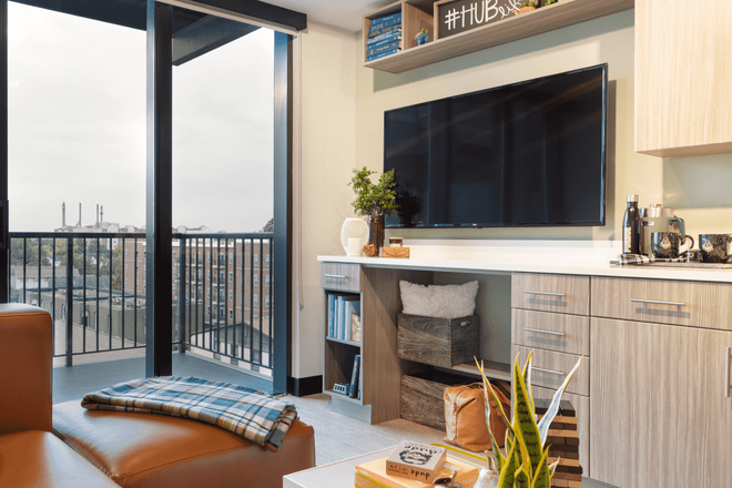 Living room area - Hub on Campus State Street Apartments