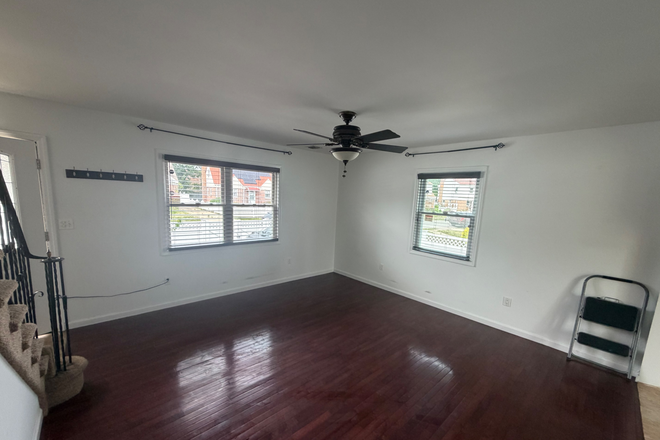 Living Room - Rooms in 4 bedroom home w/ Deck for rent