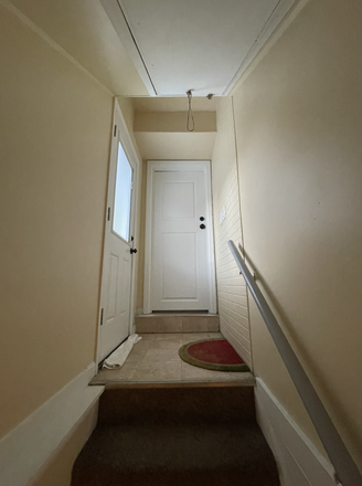 Basement Entrance/Exit on Left Side of the House - Furnished Walkout Basement Apartment (2 Bed, 1 Bath) | on UMD Shuttle Route