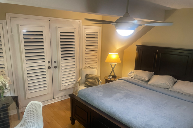 private bedroom with sitting area desk and television.   double doors provide excellent views of ballet on your own private balcony. - 1330 Altona Rd private suite in shared house minutes from UTSC -TTC at doorstep.