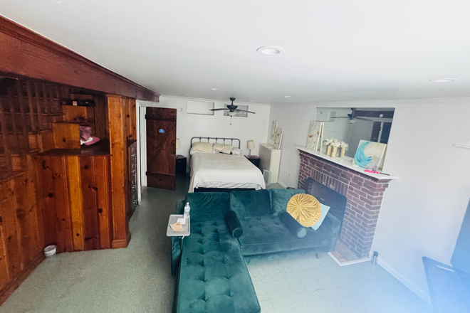 Bedroom Showing Bathroom Door and Shelving - ALL UTILITIES & PARKING INCLUDED ($550 Value!) | Furnished 1BR/1BA - 1.6 Mi to UMD