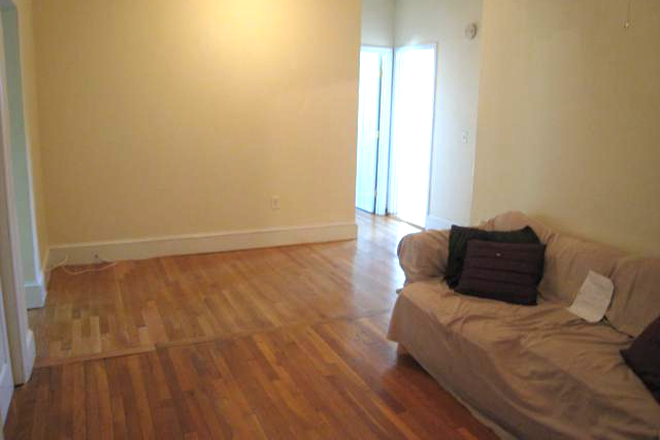 Visit hubrealtyproperties.com - Beautiful 4 bedroom 2 bath with street views, next to green line T Condo