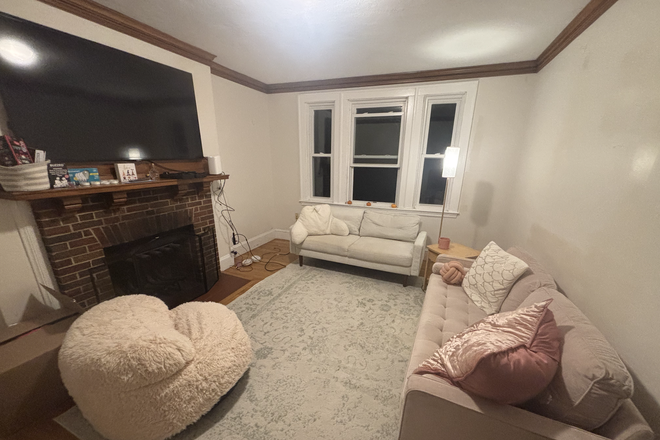 Living room - SUMMER SUBLET! Spacious room with walk-in closet, 5 minute walk to campus! Duplex