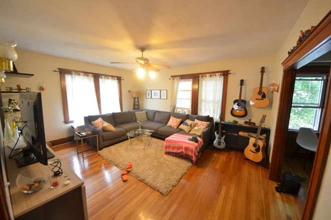 Living room - 3-Bedroom Apartment in Oak Square – Parking Included, Easy BC Commute