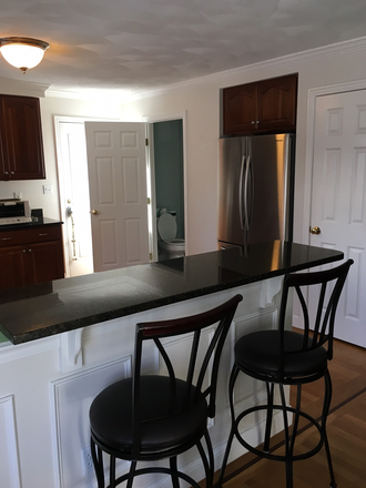 breakfast bar, 1/2 bath, big fridge/freezer, another fridge/freezer in garage - 1 bedroom & 1 bath in owner occupied 4 BR 2 1/2 bath townhouse