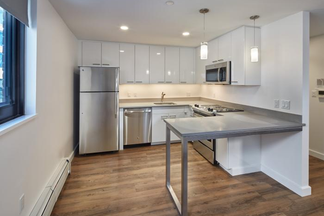 Sample Kitchen - not exact but features are the same - Soldiers Field Park Apartments