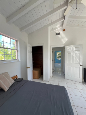 Large Bedroom with closed view to street and garden - Students love this boutique style apartment