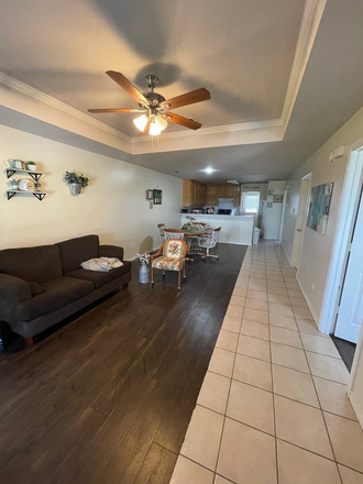 living room - Room in a 3 bedroom house on the bus route / female roommate only