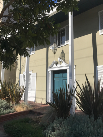 Front door to apartment is at the front of building - Beautiful Courtyard Apartment/Not a Highrise!