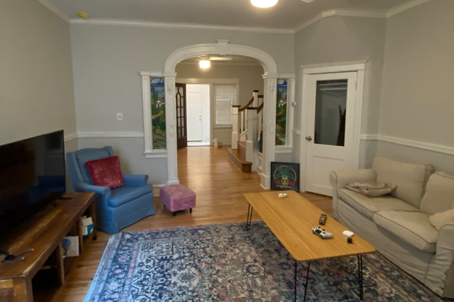 living room - EXCEPTIONAL / COMPLETELY RENOVATED, large 3 bed house DIRECTLY ACROSS THE STREET FROM CAMPUS