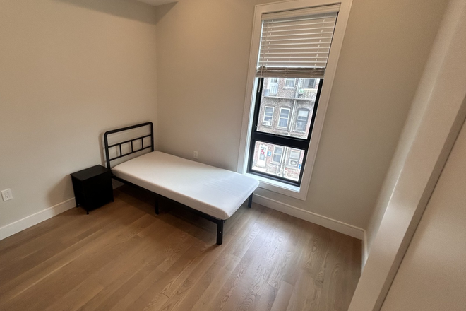 Visit hubrealtyproperties.com - Roommate Matching Program, furnished room with all utilities and wifi included, handy to the T Apartments