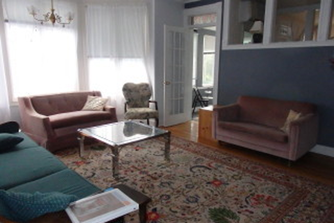 Large bright LR big enough for 3 sofas - large 2-BR/2 Bath  unit on quiet street next to Cambridge City line & Davis Square. MBTA Condo