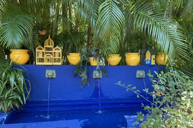 Patio Fountain adjacent to cottage - Spacious Artistic Flair Garden Cottage 2.7mi. to UM Campus Apartments