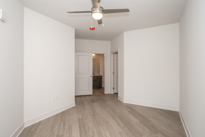 Bedroom 1 (comes with a bed and 2 desks and chair) - The Eden Apartments