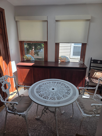Sitting room with washer/dryer enclosed - Comfortable, spacious room with full amenities in lovely, residential area outside Centra Square Duplex