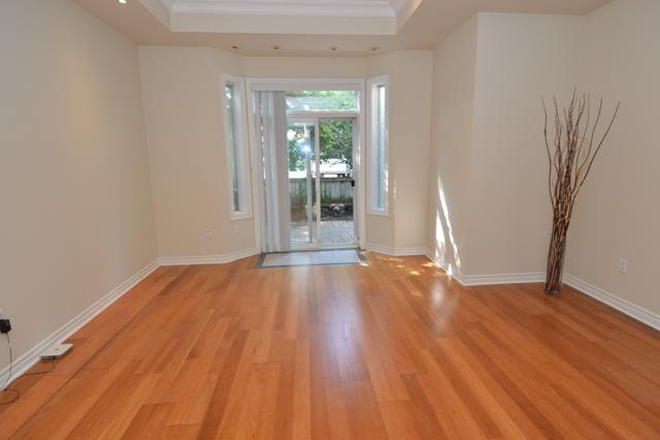 Open Concept Living & Dining Area - Executive 2-Bedroom Townhouse