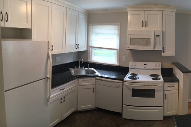 Kitchen with Granite - Available 7/1/26 Renovated 4 bedroom units with Granite counter tops & 2 free parking spaces Apartments