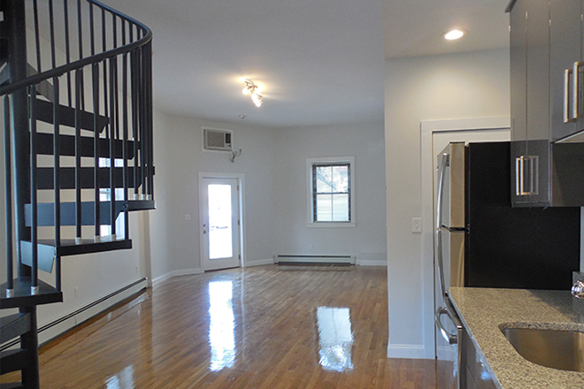 Living Room - Spacious 3-Bed, 1.5-Bath in Inman Sq | In-Unit Laundry + Heat Included Apartments