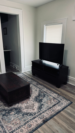 TV LOCATED IN THE LIVINGROOM - Charming  Furnished apartment ready for you , just add your final touch