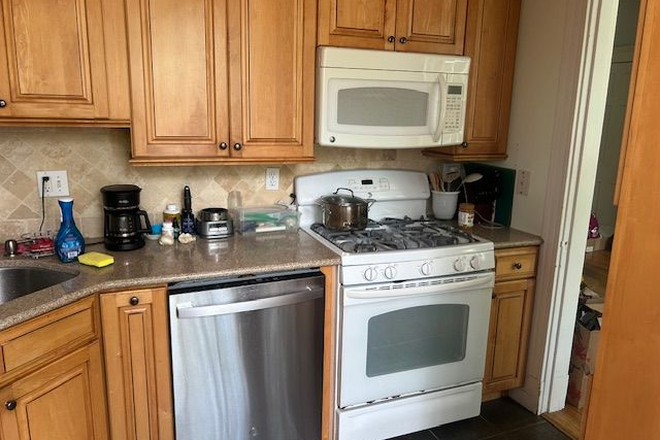 KItchen - Primary Bedroom in Coolidge Corner condo with beautiful courtyard