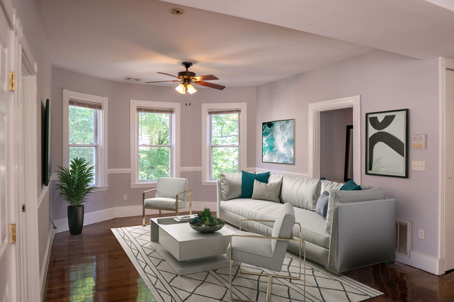 Living Area - HUGE 2-FLOOR 6Bed/2Bath with LAUNDRY - Steps from GREEN LINE! Apartments