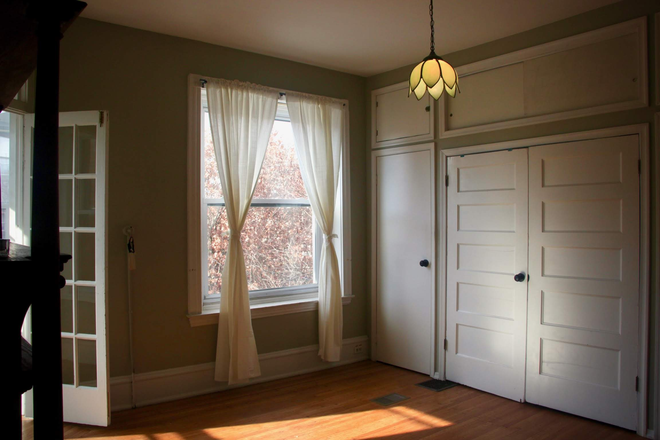Full wall of closets - Large, sunny room in shared home