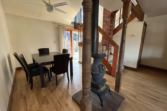 Dining area. - Female only residence! SPG 2026 SUBLEASE 3 bd 1 ba townhome, 14 min walk/ 5 min bike to campus