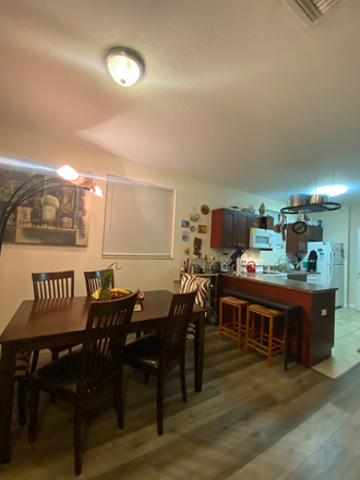 Kitchen and dining area - Homey accomodations in the heart of Davie - Room A or Room C Available