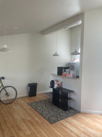 Living room from front door. - Laguna Place Apartments, Washer + Dryer, Central AC