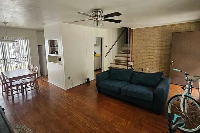 Living room and dining room. - Duplex close to campus