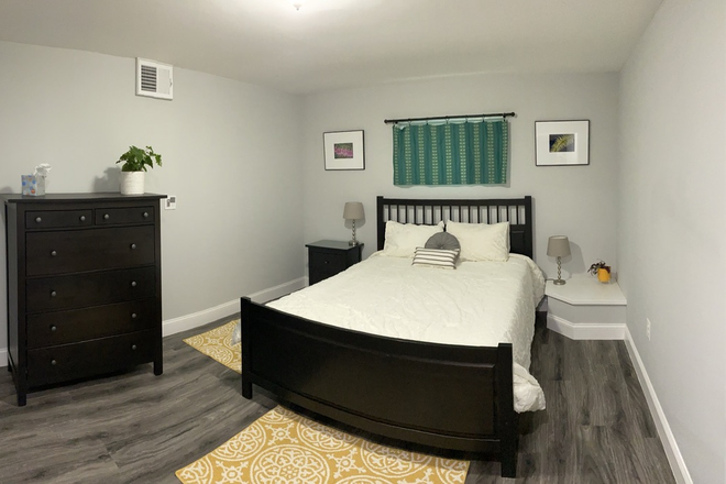 bedroom with dresser & closet - Fully Furnished Basement Apartment for your own private space