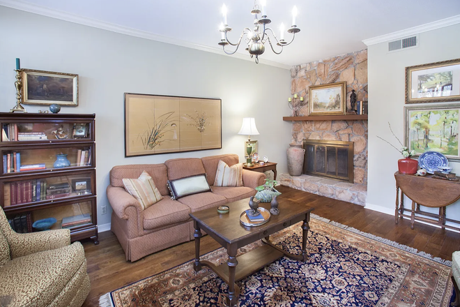sunken den with fireplace - The Glen Condominiums