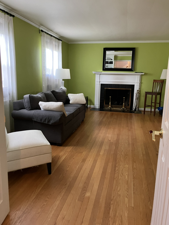 Front room with fireplace, view from the hall, option to use as a second bedroom - Multi room suite just 18 min from GU House