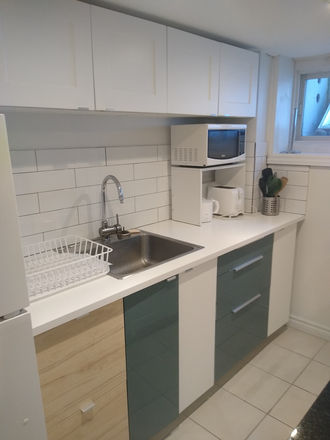 Kitchen - Bright, self contained, furnished one bedroom. Private entrance. Utilities and wifi included.