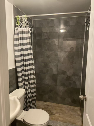 Washroom - 1 Furnished Bedroom in Basement with two person share washroom