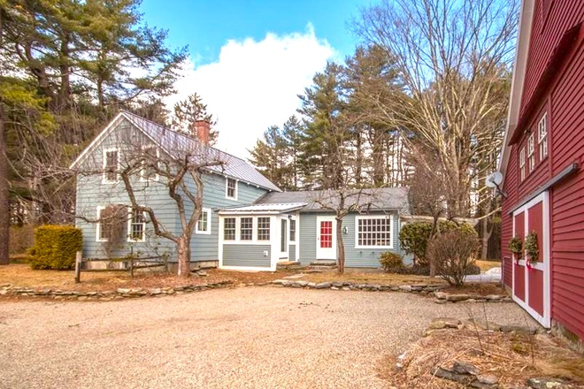 Side view of house from driveway with mudroom (main) entry - Lovely home in a lovely rural setting - 15 minutes from Amherst