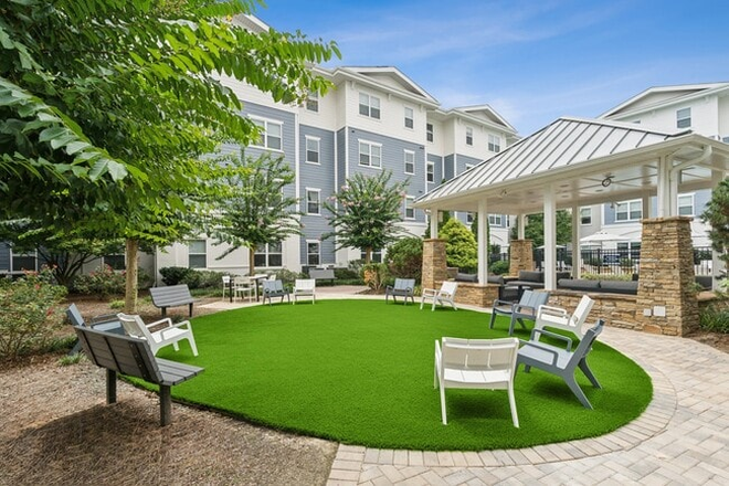 Apartment courtyard and outdoor seating - RELET) 1 Room in 3BR/3BA at Campus Crossings  Briarcliff