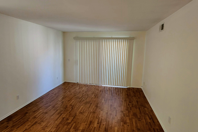 Living Room (Balcony past the window) - 2 Bedroom Apt at The Woodlands