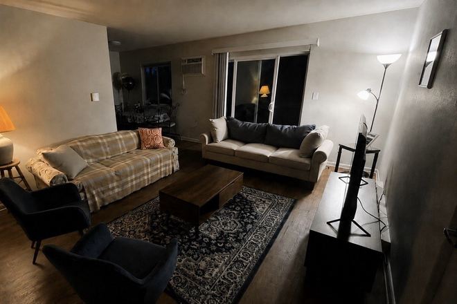 Living room - Sublease Available – Happy Hollow Apartments (University Crossing)